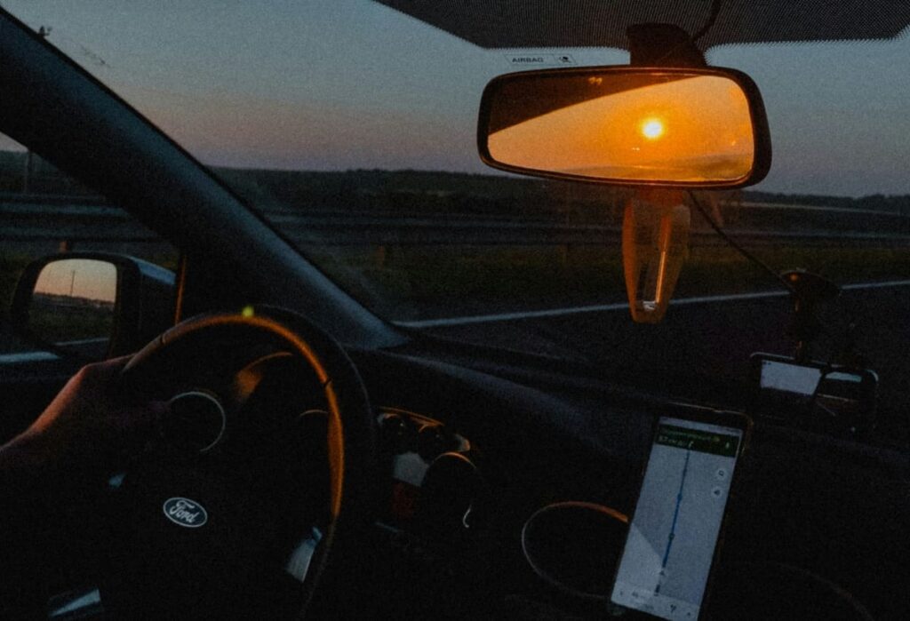 Open road at sunrise symbolizing embracing change and giving yourself grace through life's transitions